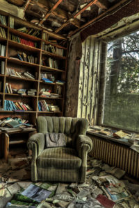 old armchair in an abandoned house old armchair in an abandoned house